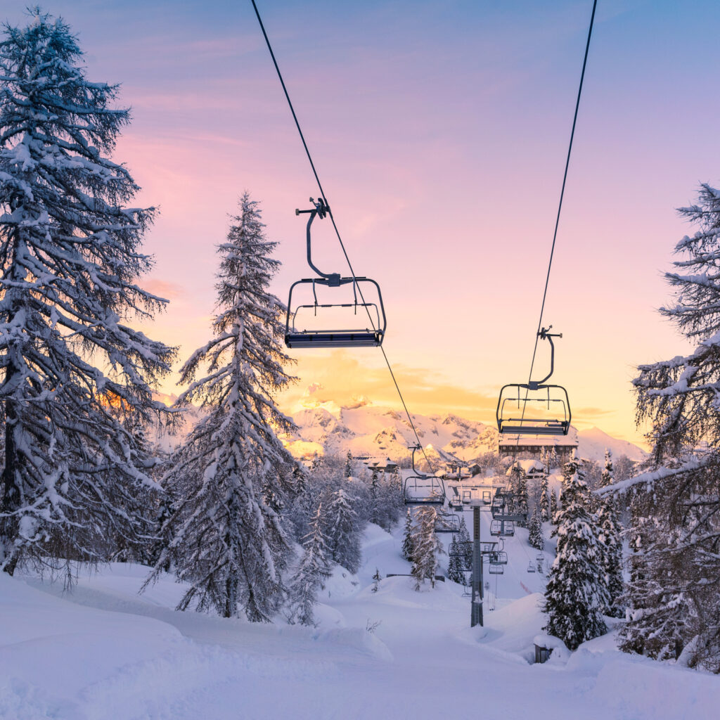 winter mountains panorama with ski slopes and ski lifts