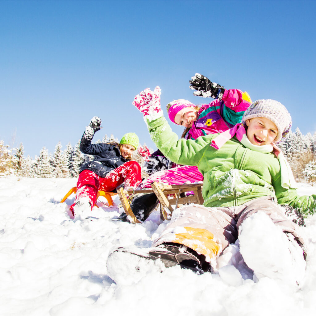 happy children at winter time. group of children spending a nic